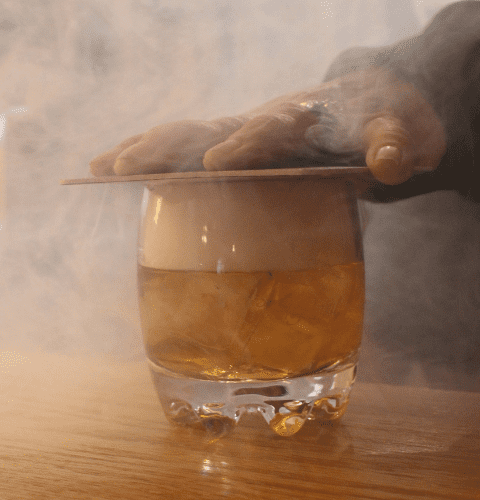 Smoked bourbon in a small glass